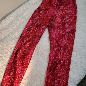 Emily Hsu - red, snake skin patterned leggings. Size S
